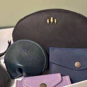 Elegant Roswell Pouch wristlet Large with brass accents.